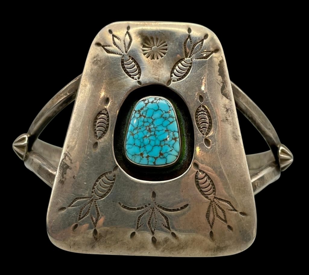 Webbed Turquoise Shadowbox Bracelet: For your bidding enjoyment we present a webbed turquoise shadowbox bracelet. This bracelet features a central turquoise cabochon with great webbing resting in a smooth silver bezel. Surrounding the se
