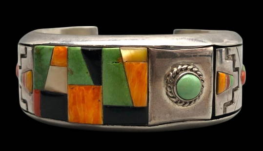 Multi Stone Inlay And Overlay Bracelet: Presented for your consideration is a multi stone inlay and overlay bracelet. This bracelet showcases a beautiful cobblestone inlay design created with spiny oyster, onyx, turquoise and mother of pear