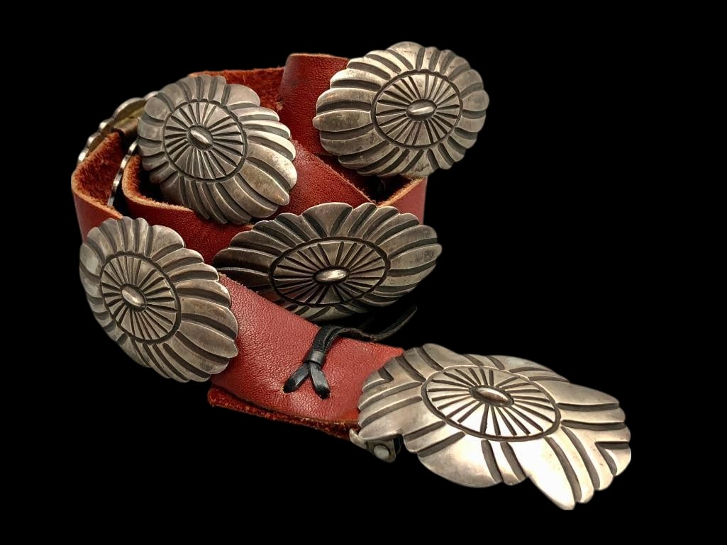 Sterling Silver Concho Belt- Perfect For Pants!: Offered here for your consideration is a sterling silver concho belt that is perfect for your favorite pair of pants. This belt features eight lovely sterling silver conchos and a matching buckle each