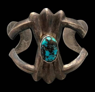 Vintage Sandcast Bracelet With Nice Turquoise Stone: For your bidding enjoyment we present a vintage sandcast bracelet with a nice turquoise stone. This bracelet showcases a lovely turquoise cabochon resting in a sawtooth silver bezel. Finishing this pi
