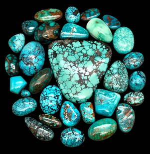 Approximately 784 Carats Miscellaneous Webbed Turquoise Cabochons: Offered here for your consideration are approximately 784 carats of miscellaneous webbed turquoise cabochons. The color ranges from light greenish blue to dark blue and most of them have great webbing
