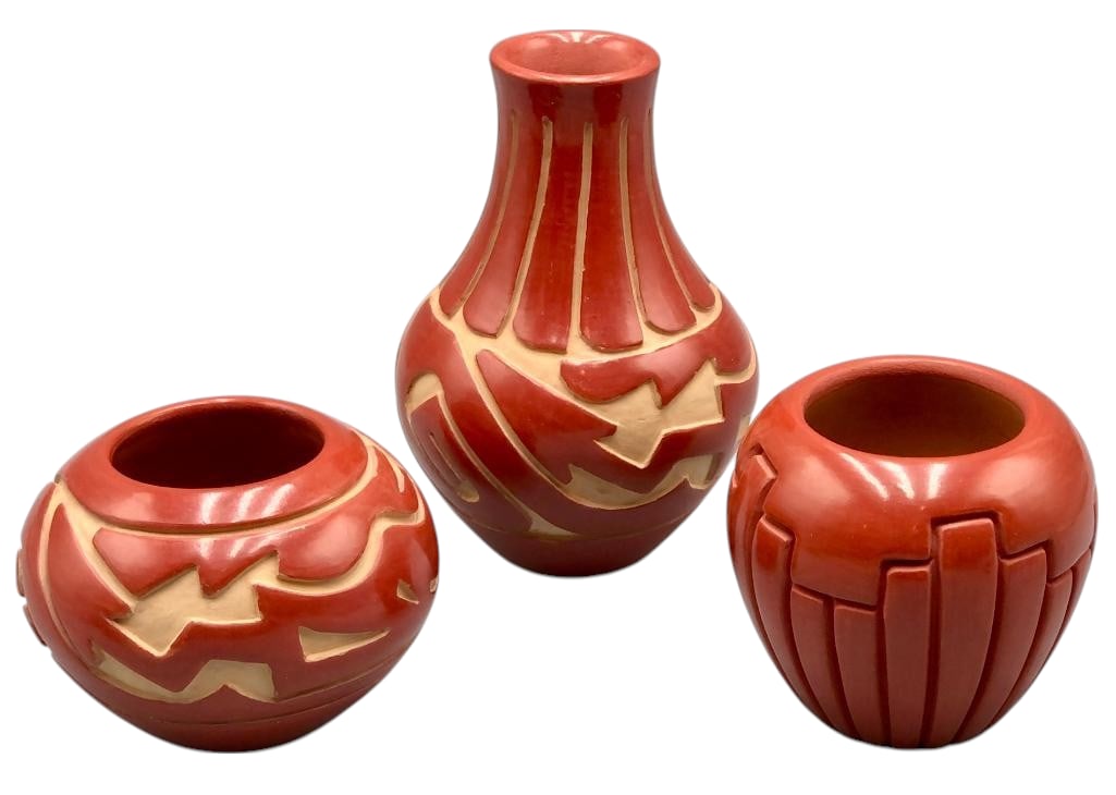 Three Deeply Carved Santa Clara Pots: Offered here for your consideration are three deeply carved Santa Clara pots. Santa Clara pottery is famous for producing handcrafted pottery specifically blackware and redware with deep engravings. T