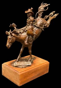 "Easy Money" A Western Bronze By Paul Crites: Offered here for your consideration is &#34;Easy Money&#34; a Western bronze by Paul Crites that is numbered 3/25. This bronze features a rodeo cowboy on a bucking horse and it is on a wood base. This