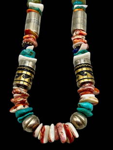 Tommy Singer Multi Stone Necklace: Offered here for your consideration is a Tommy Singer multi stone necklace. This necklace features a strand of multi stone beads in graduated sizes including turquoise, spiny oyster, lapis and shell.