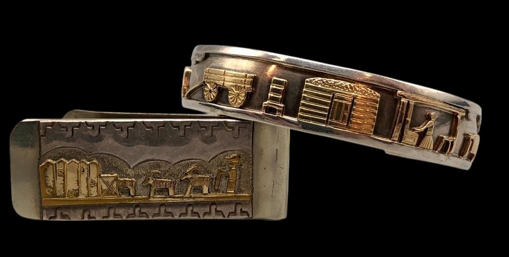 Sterling Silver And Gold Storyteller Bracelet With Money Clip: For your bidding pleasure is a sterling silver and gold Storyteller bracelet with money clip. This bracelet is beautifully highlighted with a 14K gold (marked) storyteller themed overlay design set on