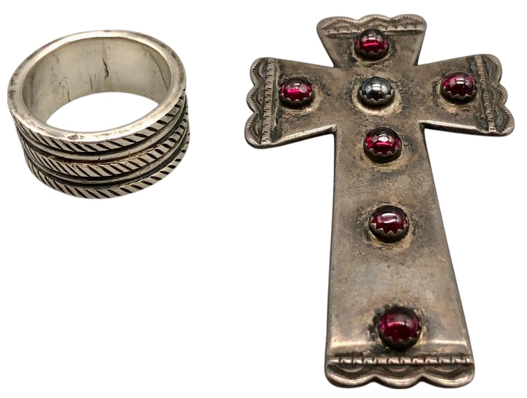 Jesse Robbins Ingot Ring And Gringo Hill Sterling Silver And Garnet Cross Pendant: Offered here is a Jesse Robbins ingot ring and Gringo Hill sterling silver and garnet cross pendant. The ring features a wide ingot sterling silver band highlighted with hand stamped designs. The acco