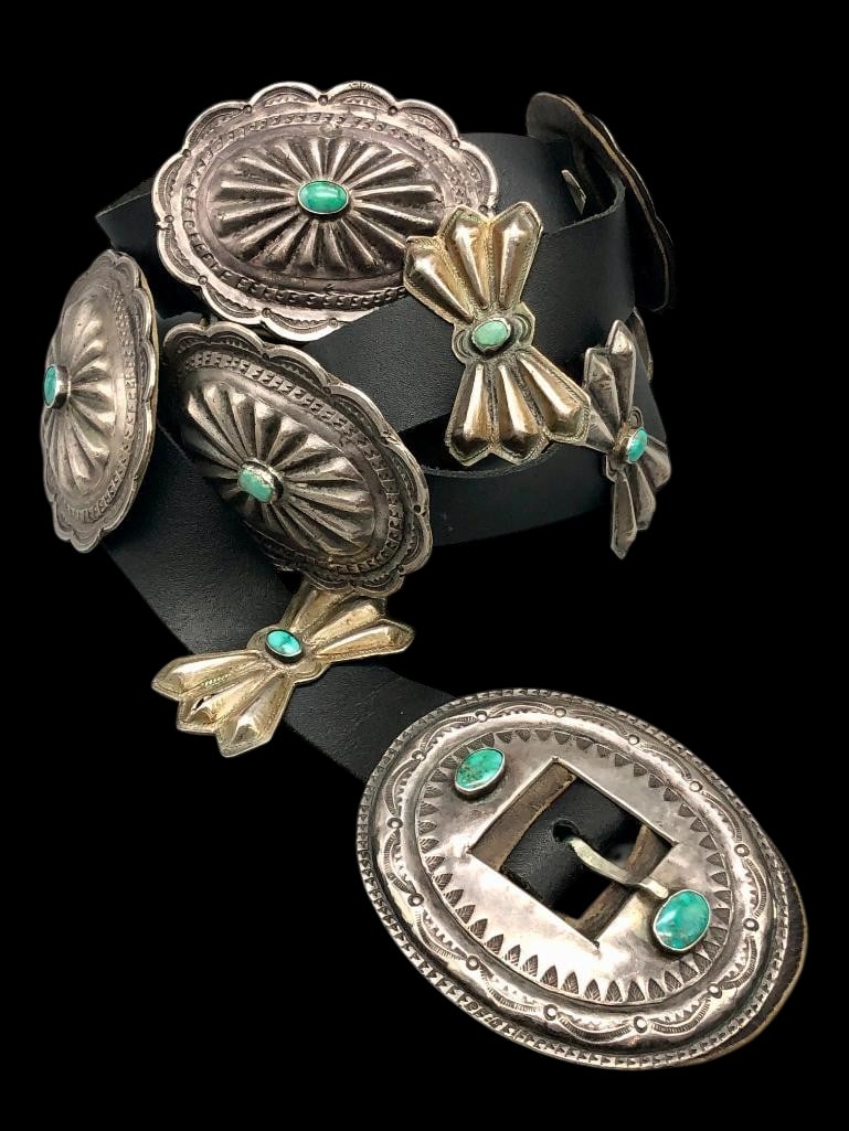Circa 1940s Turquoise And Sterling Silver Concho Belt: Offered here for your consideration is a 1940s turquoise and sterling silver concho belt. This striking belt features six butterfly conchos, six round conchos and a round buckle. Each concho is highli