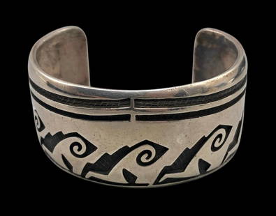 Vintage Hopi Overlay And Sterling Silver Bracelet: Offered here is a vintage Hopi overlay and sterling silver bracelet. This bracelet is highlighted with a great overlay design with near perfect cutouts. Further accenting the design is an etched and d