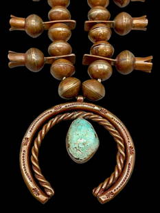 Unique Penny/Copper And Turquoise Squash Blossom Necklace: Offered here for your consideration is a unique penny/copper turquoise squash blossom necklace. This necklace features a copper two wire naja created with a twisted and hand stamped wire conjoined at