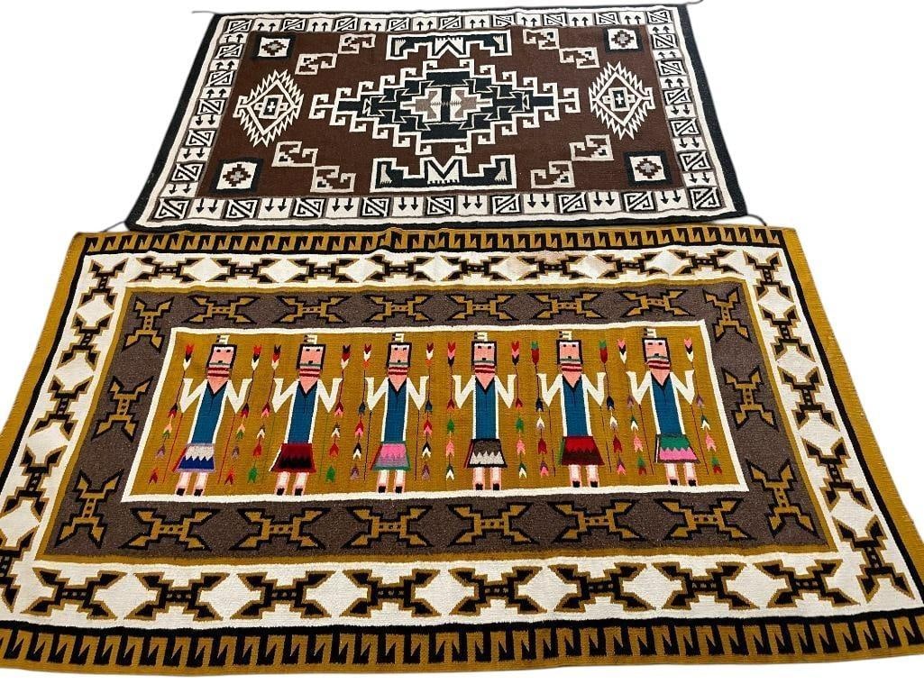 Two Large Mexican / Southwest Style Rugs: Available here for your consideration are two large Mexican made, Southwest style rugs. One rug features six figures in vibrant colors each holding strings of arrows on a gold background. The second r