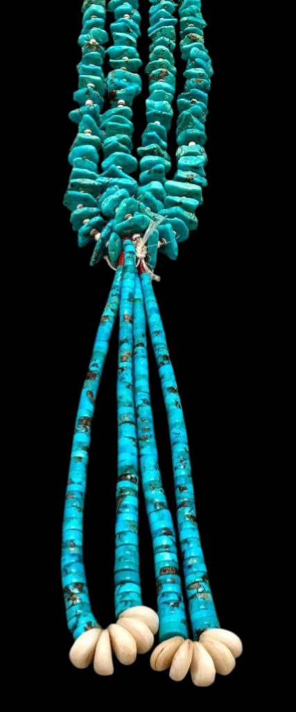 Turquoise and Heishi Necklace with Joclas: Offered here for your consideration is a turquoise and Heishi necklace with Joclas. It features two strands of turquoise nugget beads and shell Heishi beads. At the center hangs a pair of Joclas creat