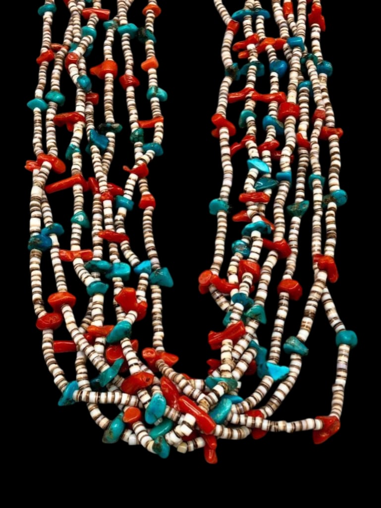 Turquoise, Coral and Heishi Multi Strand Necklace: Offered here for your consideration is a turquoise, coral and Heishi multi strand necklace. This seven strand necklace blends turquoise nuggets, red coral branches and fine shell Heishi beads for a gr
