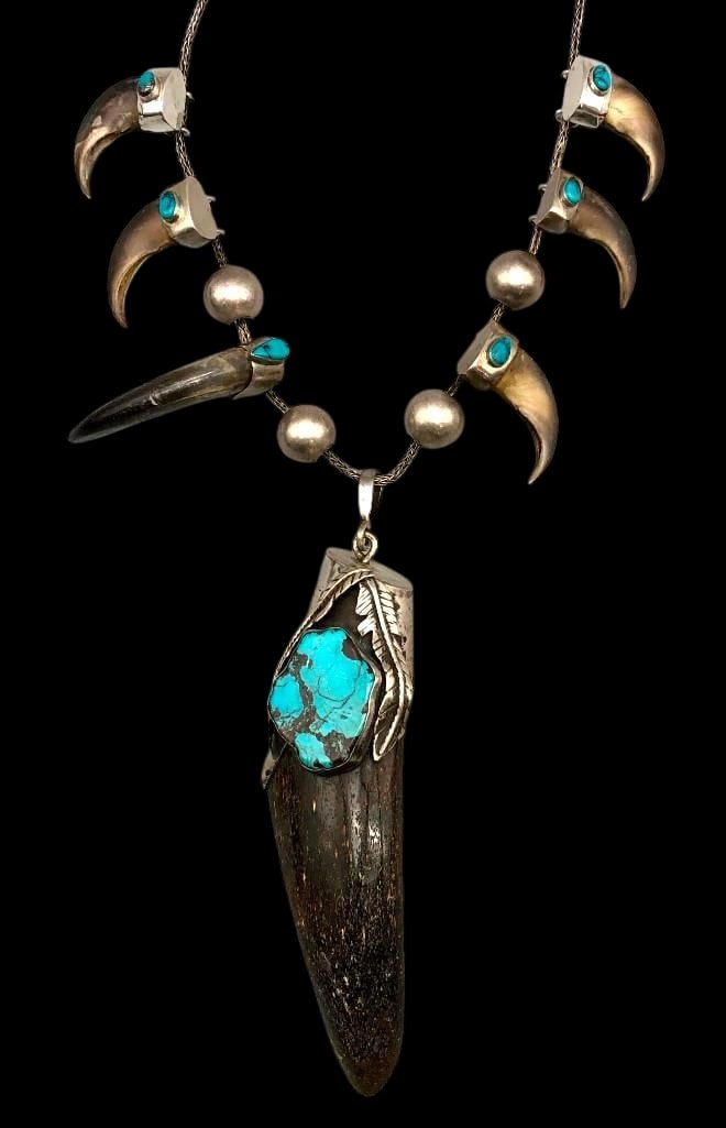 Vintage Turquoise, Sterling Silver, Claw & Fossilized Tusk Necklace: Offered here for your consideration is a vintage turquoise, sterling silver, claw and fossilized tusk necklace. This piece features six claws and a large fossilized tusk each set in smooth silver caps