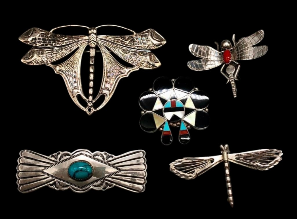 Five Sterling Silver Pins: Offered here for your consideration are five sterling silver pins. This group features a selection of figural and inlaid designs including dragonflies, one with a coral cabochon, a butterfly, a Sunfac