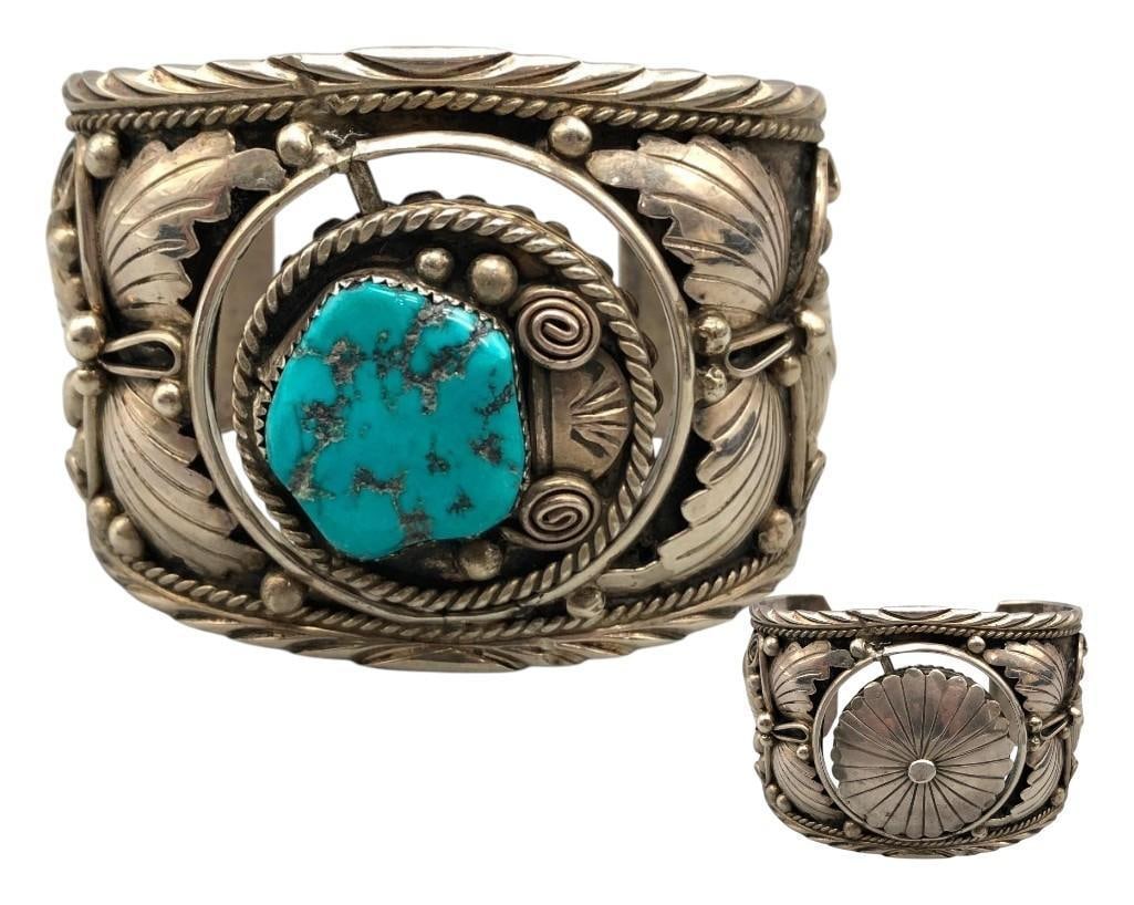 Unique Turquoise And Sterling Silver Spinner Bracelet: Offered here for your consideration is a unique turquoise and sterling silver spinner bracelet. This wide cuff is highlighted with heavy silver applique including stamped leaf elements, twisted wire,