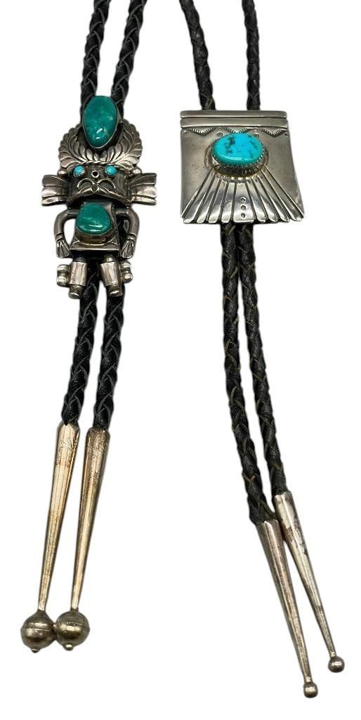 Two Turquoise and Sterling Silver Bolo Ties: Offered here for your consideration are two turquoise and sterling silver bolo ties. One bolo features a Kachina figure accented with four turquoise cabochons resting in smooth or sawtooth silver beze