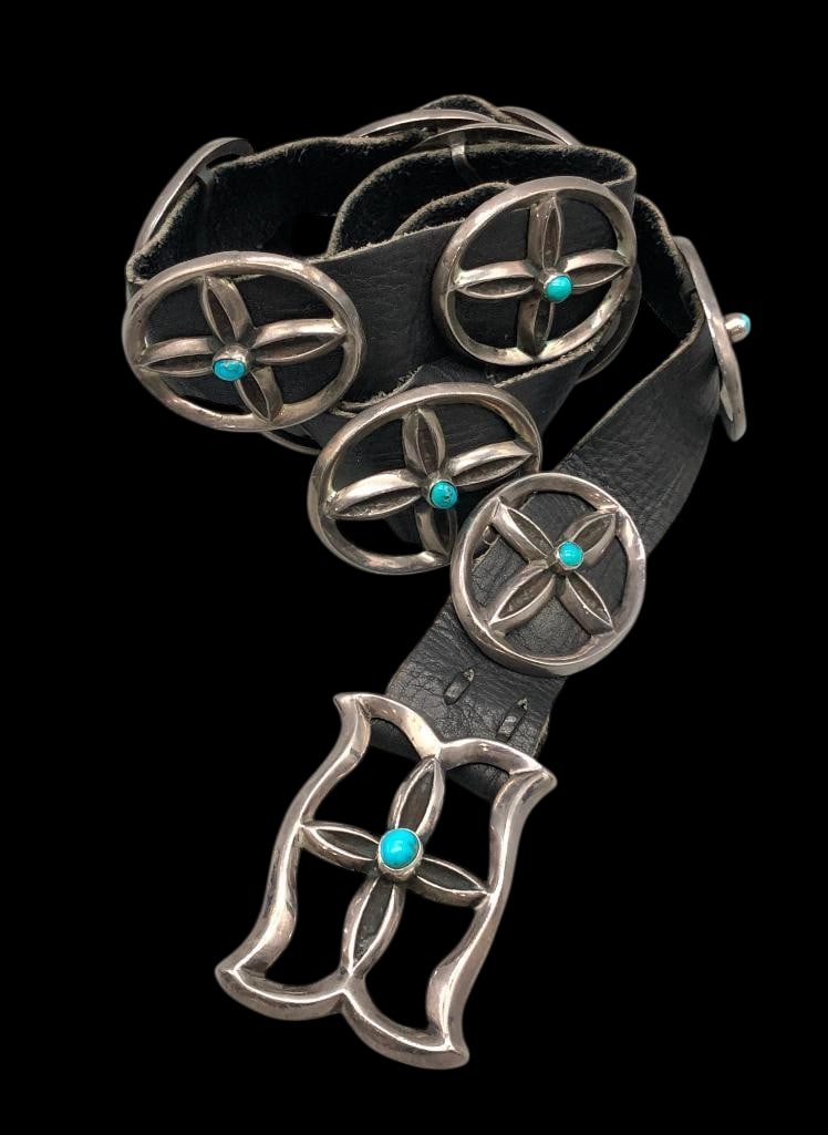 Vintage Sandcast Turquoise Concho Belt: Offered here for your consideration is a vintage sandcast turquoise concho belt. The belt has 13 oval sandcast conchos and one rectangular buckle each centered with turquoise cabochons set in smooth s