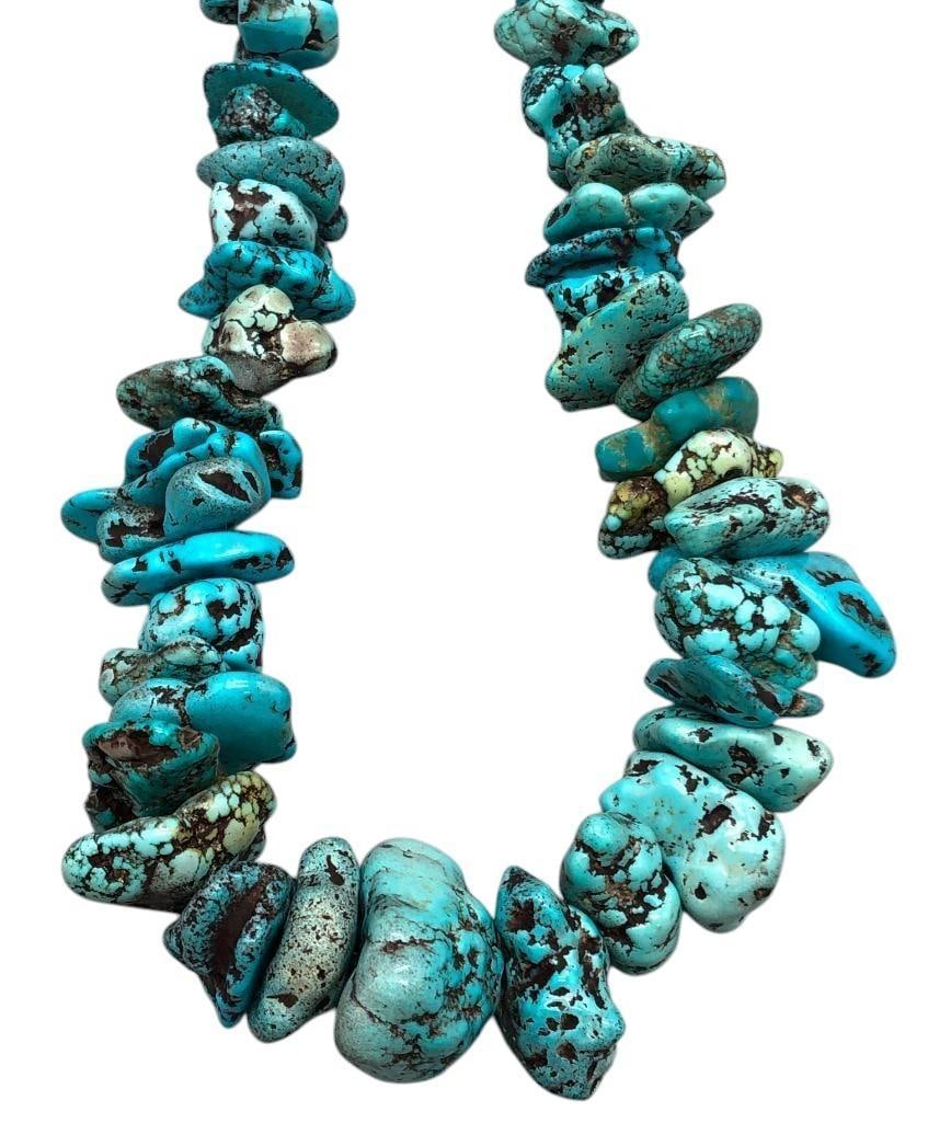 Vintage Chunky Turquoise Necklace: Offered here for your consideration is a vintage chunky turquoise necklace. This necklace features a strand of Lone Mountain turquoise nugget style beads in graduated sizes. *NOTE: The necklace has be