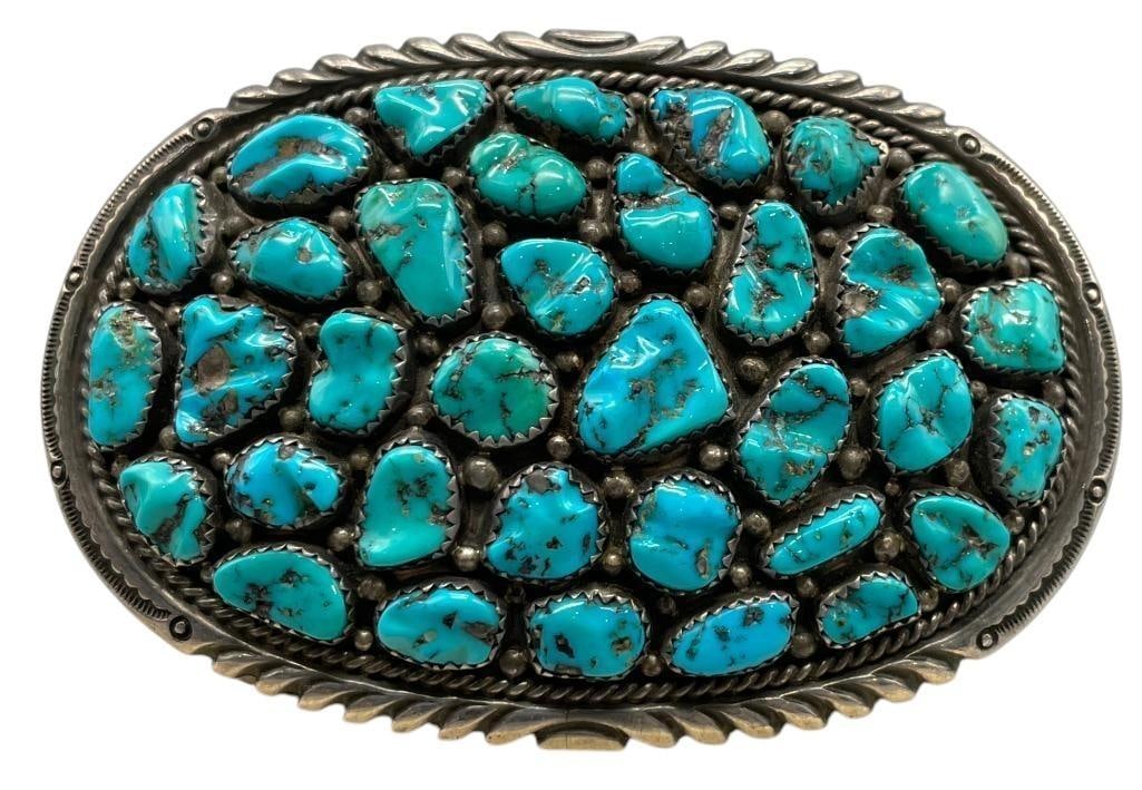 Vintage Turquoise Cluster Belt Buckle By Wilford Nez: Offered here for your consideration is a vintage turquoise cluster belt buckle by Wilford Nez. This buckle features numerous turquoise cabochons set in handmade sawtooth bezels accented with twisted w