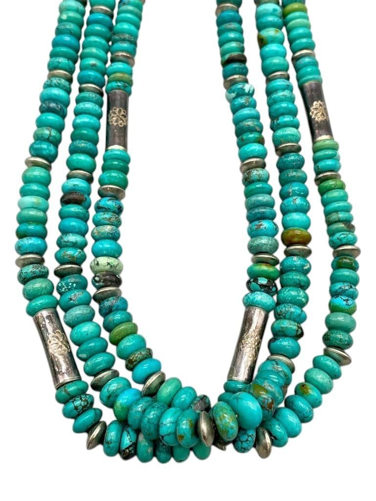 Three Strand Turquoise & Sterling Silver Necklace: Offered here for your consideration is a three strand turquoise and sterling silver necklace. Each strand is strung with round turquoise beads interspersed with round and cylindrical sterling silver b