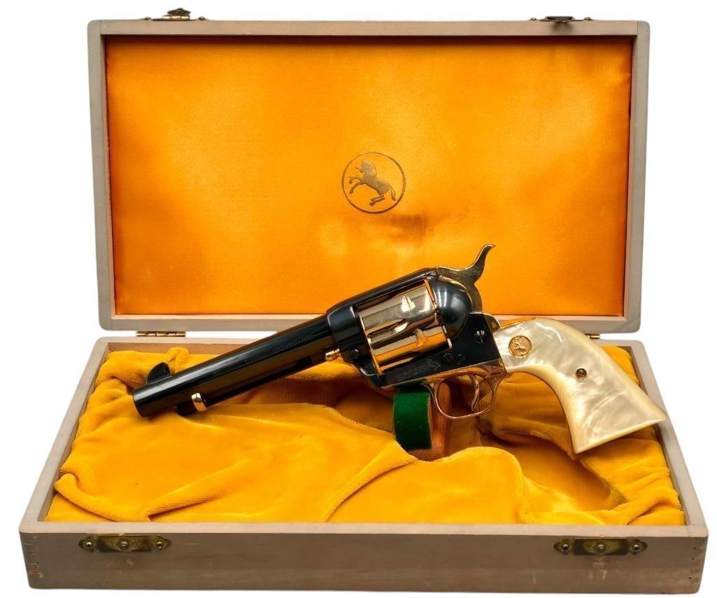 Arizona Territorial Centennial Commemorative Cold Pistol With Display Box: For your bidding pleasure is a pristine Arizona Territorial Centennial Commemorative Colt revolver with display box. This Colt features a blued and gold finish with Colt medallion pearl-style grips an