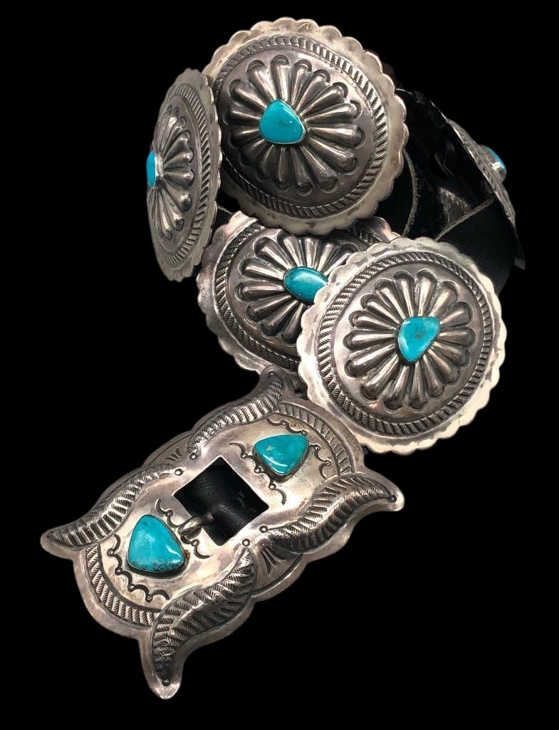 Fabulous Vintage Sterling Silver And Turquoise Concho Belt: Offered here for your consideration is a fabulous vintage sterling silver and turquoise concho belt. The belt has eight round conchos and one rectangular buckle. Each concho is highlighted with one tu