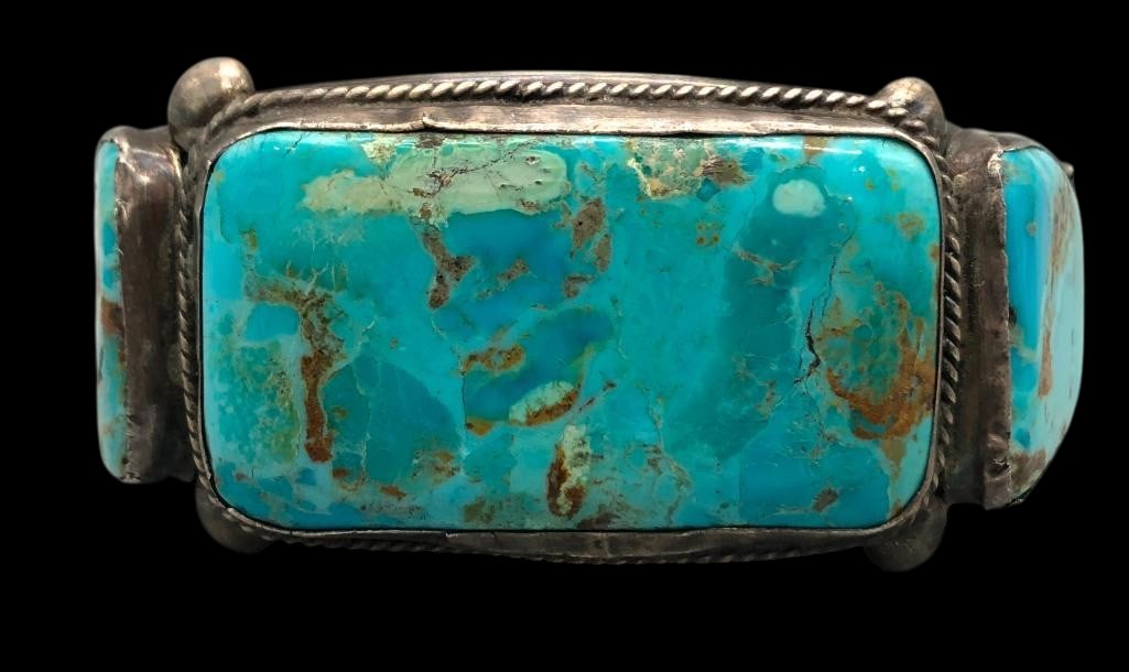 Vintage Three Stone Turquoise Bracelet: For your bidding enjoyment we present a vintage three stone turquoise bracelet. This bracelet features three large rectangular turquoise cabochons set in smooth silver bezels framed with twisted wire