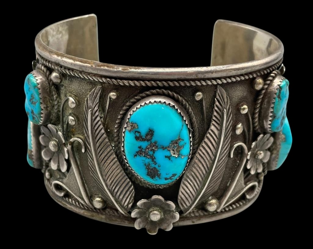 Five Stone Turquoise And Sterling Silver Bracelet: For your bidding enjoyment we present a five stone turquoise and sterling silver bracelet. This bracelet features five turquoise cabochons set in sawtooth silver bezels. The settings are on a sterling