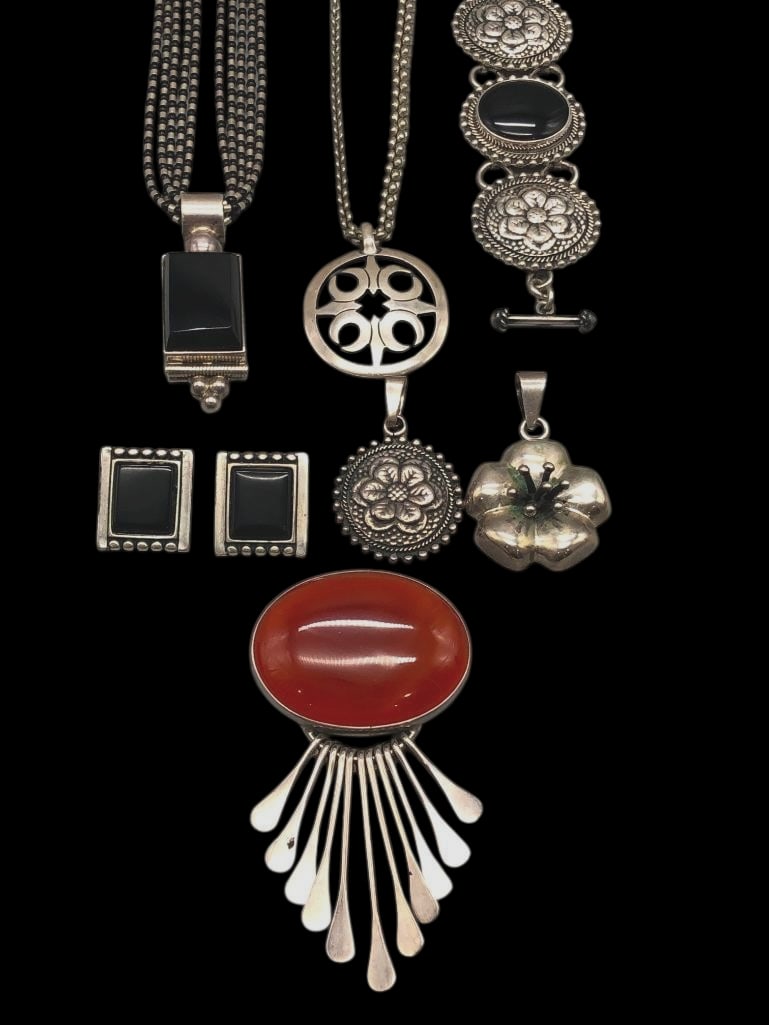 Group Of Sterling Silver Jewelry Mostly From Mexico: Available here for your consideration is a group of sterling silver jewelry mostly from Mexico. The group includes two necklaces, three pendants, one pair of earrings and a bracelet. Four of the piece