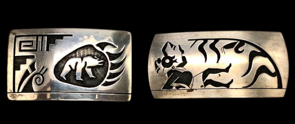 Two Sterling Silver Belt Buckles by Laurence Saufkie: Available here for your consideration are two sterling silver belt buckles by multiple award winning artist and Arizona Indian Living Treasure artist Laurence Saufkie. Each buckle is decorated with ov