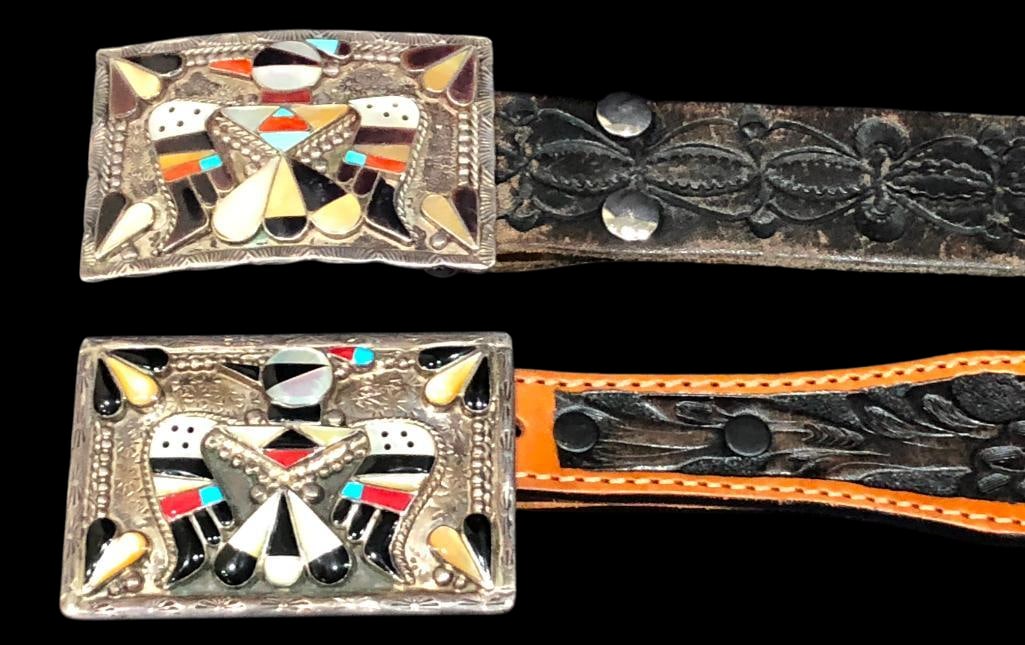 Two Thunderbird Themed Inlay Buckles With Belts: Available here for your consideration are two Thunderbird themed inlay buckles with belts. Each buckle features multi stone inlay created with turquoise, coral, shell, and others accented with detaile