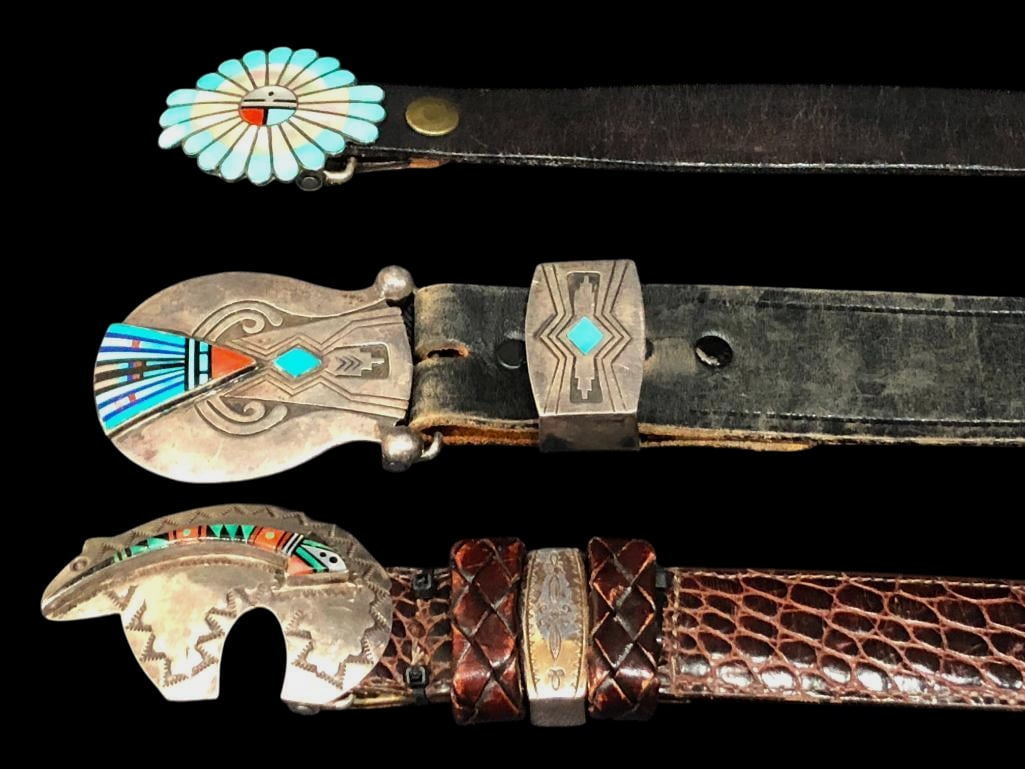Three Inlay And Sterling Silver Buckles With Belts: For your bidding enjoyment we present three inlay and sterling silver buckles with belts. The multi stone inlays are in a channel inlay Sunface design, a bear design. and a triangular shaped design wi