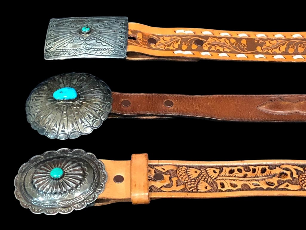 Three Turquoise And Sterling Silver Buckles With Belts: For your bidding enjoyment we present three turquoise and sterling silver buckles with belts. Each buckle in various shapes features one turquoise cabochon resting in a smooth or handmade sawtooth sil