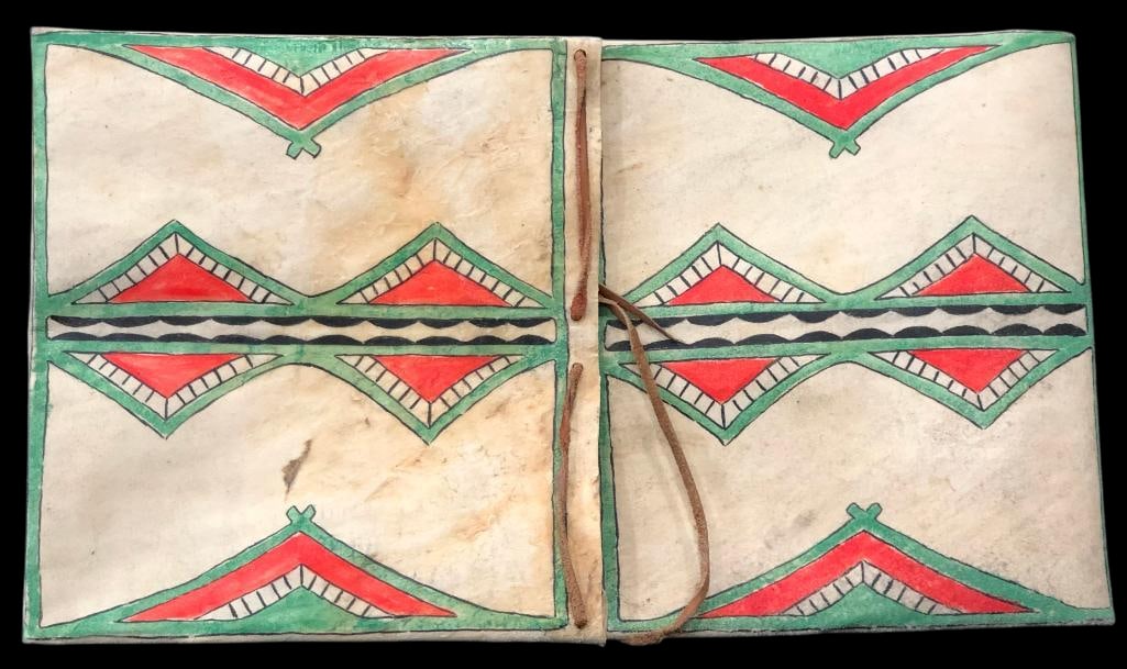 Large Parfleche Container: Offered here for your consideration is a large parfleche container. This rawhide case is decorated with bold painted geometric designs in red, green and black pigments. Parfleche containers were tradi