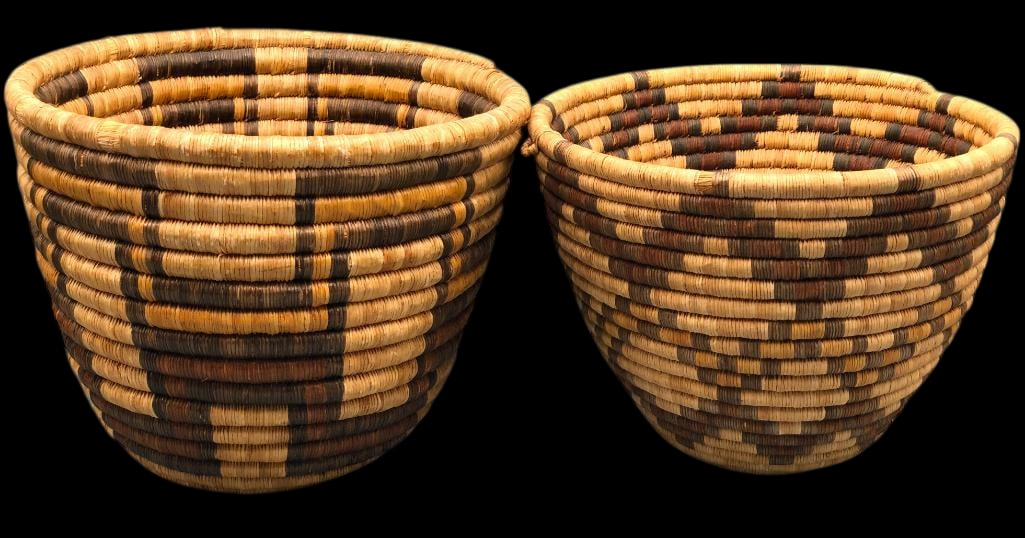 Two Large Vintage Hopi Coiled Baskets: Offered here for your consideration are two large Hopi coiled baskets. Each is woven in natural fibers forming bold geometric patterns. Large baskets like these are highly collectible and would make n