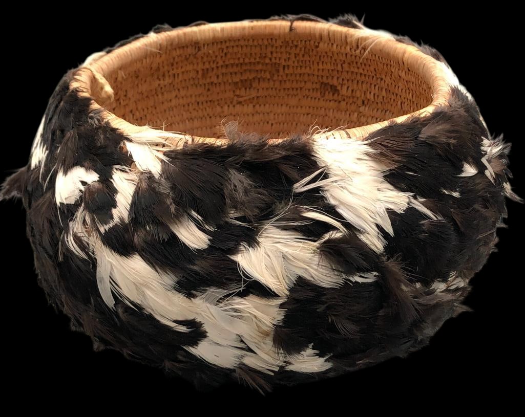 Vintage Pomo Feathered Basket: Presented here for your consideration is a vintage Pomo feathered basket. This basket is decorated with a black and white feather overlay creating a striking visual effect. Feather baskets are highly 