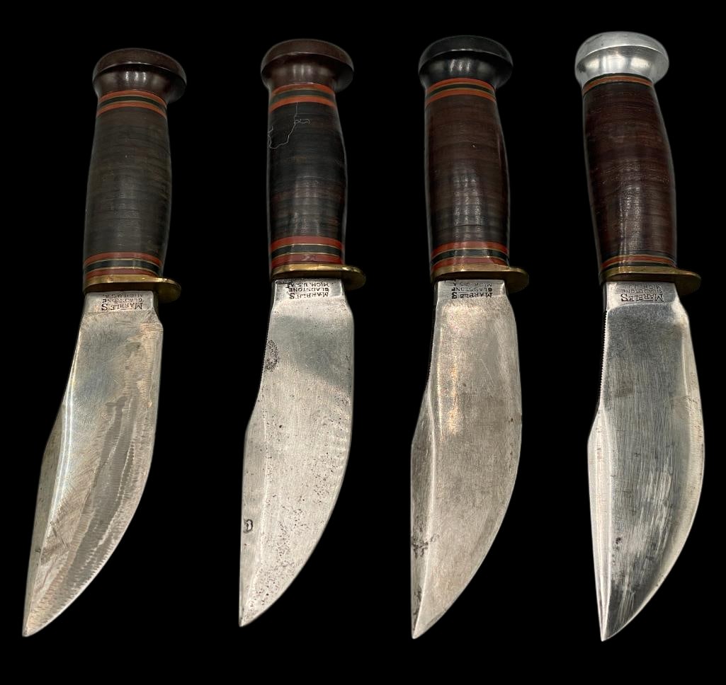 Four Marbles Woodcraft Fixed Blade Knives: Offered here for your consideration is a group of four Marbles Woodcraft fixed blade knives. Marbles began in 1892 as Marble Arms. Each knife features stacked leather handles with brass guards and alu