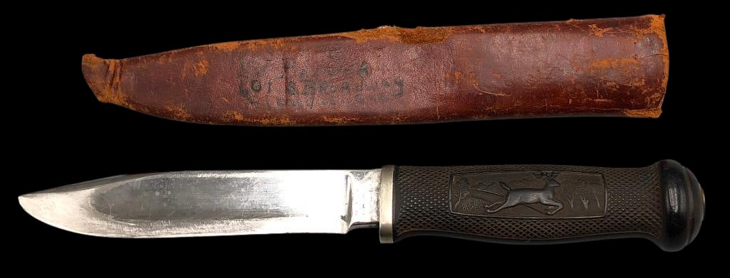 Rare Marble's Ideal #43 Fixed Blade Knife: Offered here for your consideration is a rare Marble’s Ideal #43 fixed blade knife. The handle is molded with a stag and hunter scene. The knife comes with a leather sheath. *NOTE: There is some dam