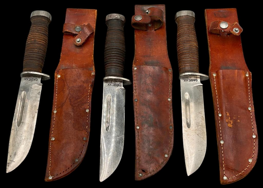 Three WWII Case XX Knives: Offered here for your consideration is a group of three WWII Case XX knives. Each knife features a stacked leather handle and comes with its leather sheath. These WW2 era knives are collectible exampl
