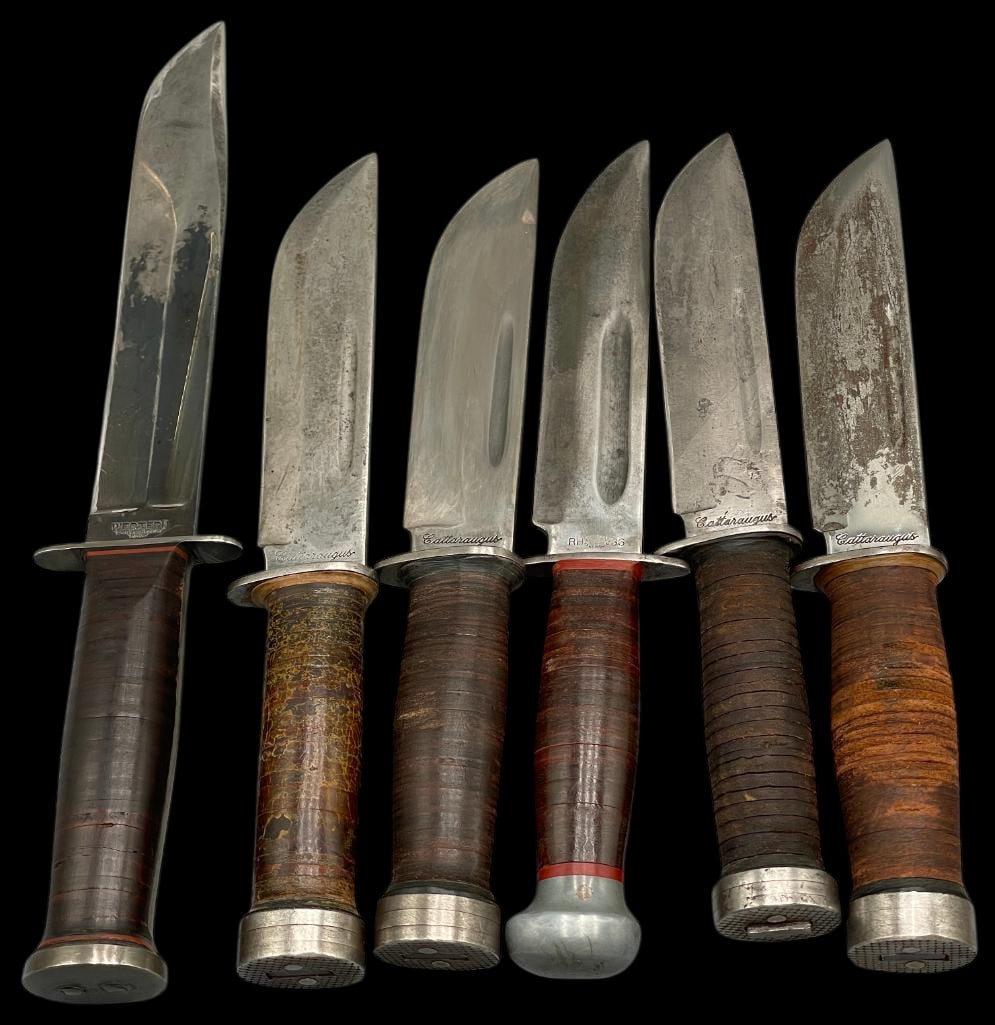 Six WW2 Era Fighting Knives With Sheaths: Offered here for your consideration is a group of six WWII era fighting knives with sheaths. There are four Cattaraugus 225Q knives, one Western Brand knife with stacked leather handle and one RH PAL