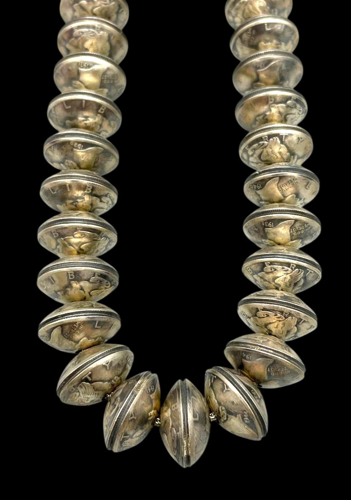 Dime Bead Necklace With Pearl Accents: Offered here for your consideration is a dime bead necklace with pearl accents. The necklace features a strand of dime beads with pearl bead accents at the end. They are strung on a foxtail wire finis