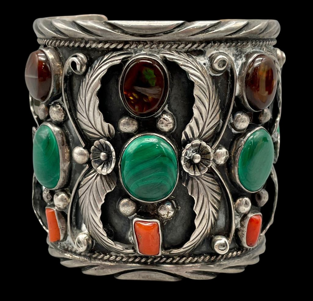 Large Sterling Silver Bracelet With Coral, Fire Agate And Malachite By Vero: Offered here for your consideration is a large sterling silver bracelet set with coral, fire agate and malachite by Vero. The bracelet features multiple cabochons set in smooth silver bezels. Accentin
