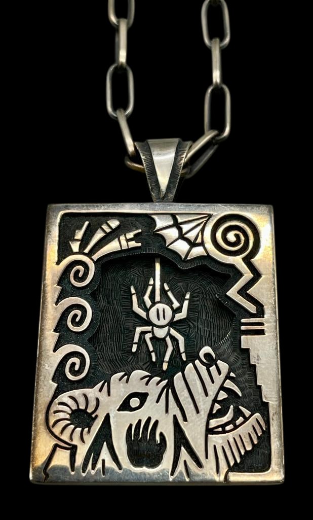 Sterling Silver Overlay Spider Themed Pendant With Chain By Howard Dennis: Offered here for your consideration is a sterling silver overlay spider themed pendant with chain by Howard Dennis. This pendant features an overlay spider surrounded by a shadow box background with a