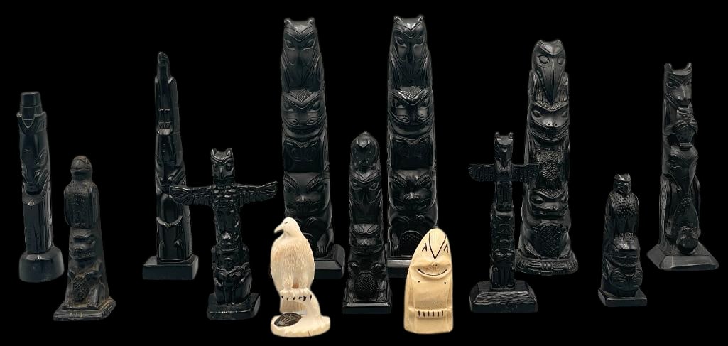 Set Of 11 Resin Totems And Two Ivory Carvings: Offered here for your consideration is a set of 11 black resin totems and two ivory carvings. Several of the totem designs are labeled British Columbia, Canada, while one ivory piece bears an Alaska l