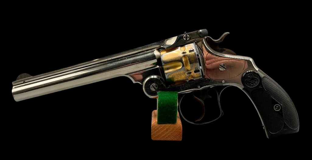 Antique S&W Revolver In .44 Russian Cal: For your bidding pleasure is an antique Smith & Wesson revolver in .44 Russian caliber. It features a nickel finish with what appears to be a gold wash cylinder, checkered black S&W logo grips and a 6