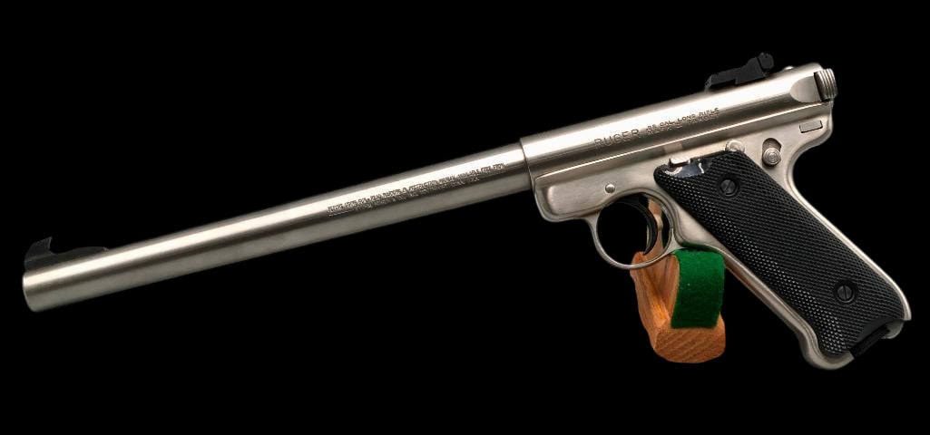 Ruger Mark II Target .22 Caliber Long Rifle Pistol: Offered here for your consideration is a Ruger Mark II Target .22 LR caliber pistol. This stainless firearm features a heavy bull barrel, adjustable rear sight and black polymer grips. This is a rare