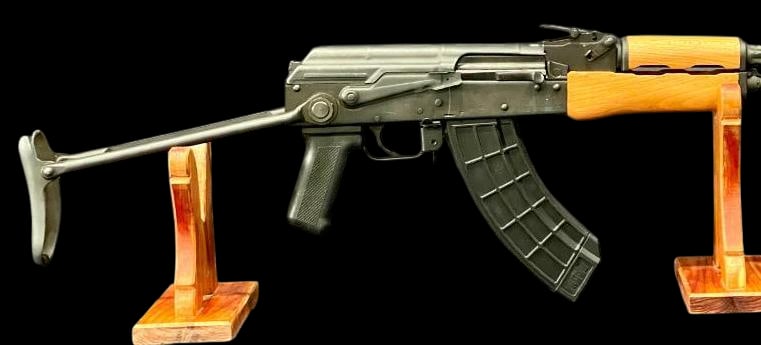 Romarm Cugir WASR-10UF Semi Auto Rifle 7.62 x 39 Caliber: Offered here for your consideration is a Romarm Cugir WASR-10UF semi-automatic rifle chambered in 7.62 × 39mm caliber. This rifle features a classic AK-style design with a side folding metal stock, b