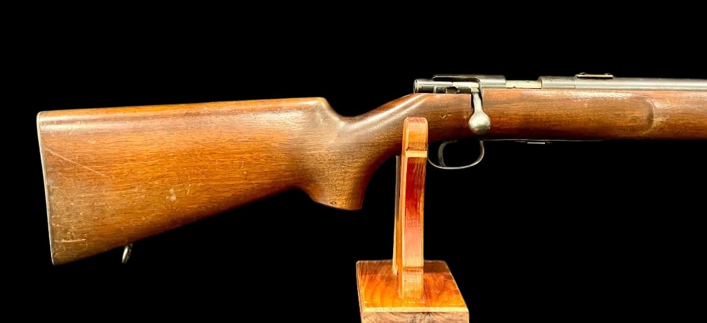 Winchester Model 75 .22 Caliber Bolt Action Rifle: Offered here for your consideration is a Winchester model 75 .22 caliber bolt action rifle. This firearm features a classic walnut stock, blued steel barrel, factory iron sights and sling swivels. Kno