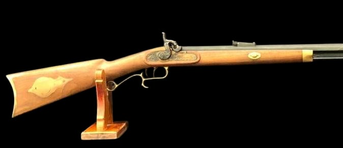 50 Cal Black Powder Percussion Reproduction Rifle: Offered here for your consideration is a .50 caliber black powder percussion rifle. This reproduction firearm features a hardwood stock with brass butt plate and patch box, a double set trigger and en