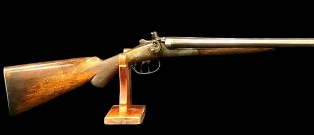 Janssen And Sons Antique Black Powder Side By Side Shotgun: Offered here for your consideration is an antique Janssen & Sons black powder side-by-side shotgun. This double barrel shotgun features a walnut stock, iron hardware and engraved lock plates marked ��